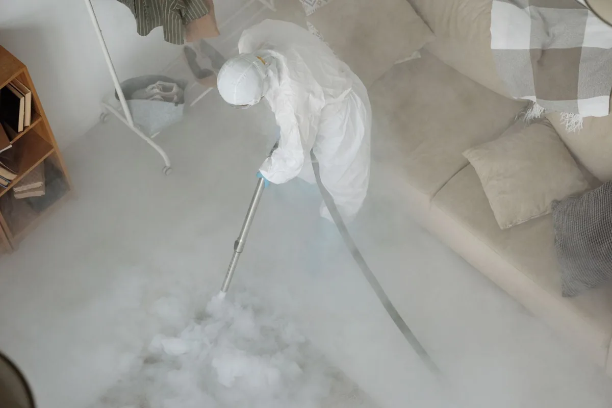 Biohazard cleanup technician in protective equipment, Briarcliff Manor, NY